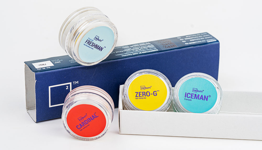 Product image of helium's classic sample pack which contains 4 samples one each of a hair cream, hair wax, hair pomade and hair clay.